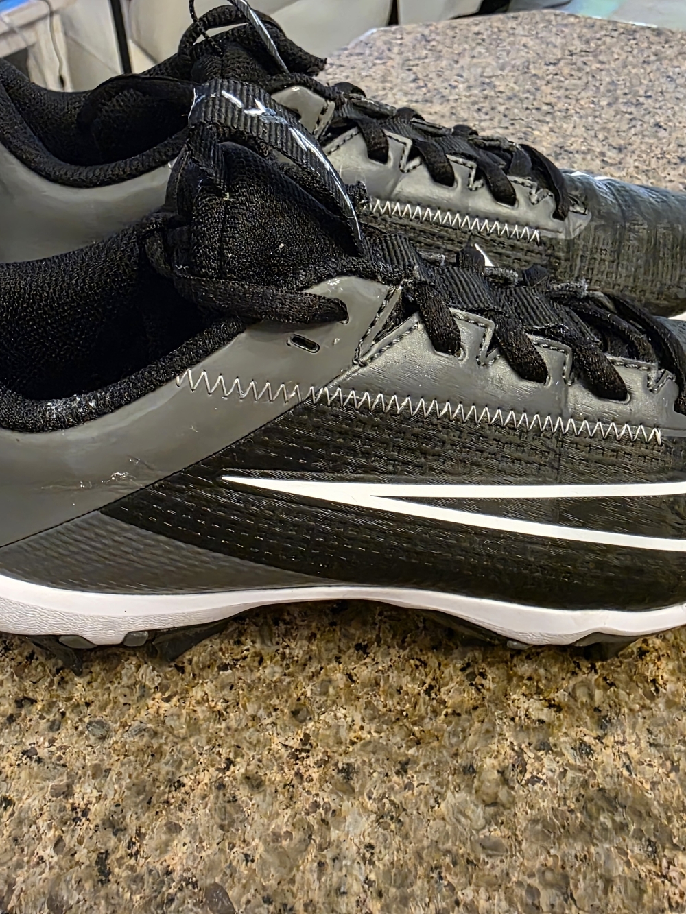 Cleets Nike Black Athletic Cleats with White Swoosh